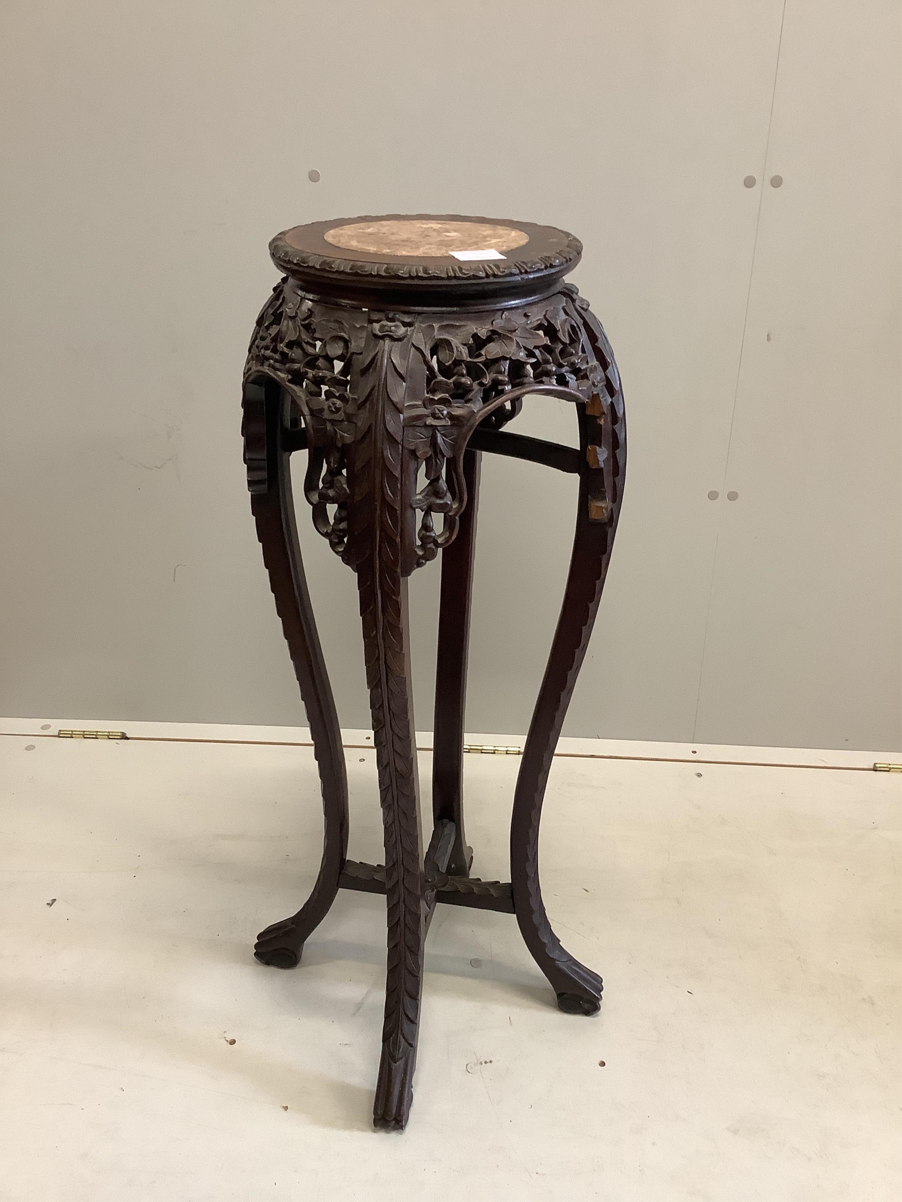 A Chinese hongmu and marble jardiniere stand, height 90cm. Condition - poor